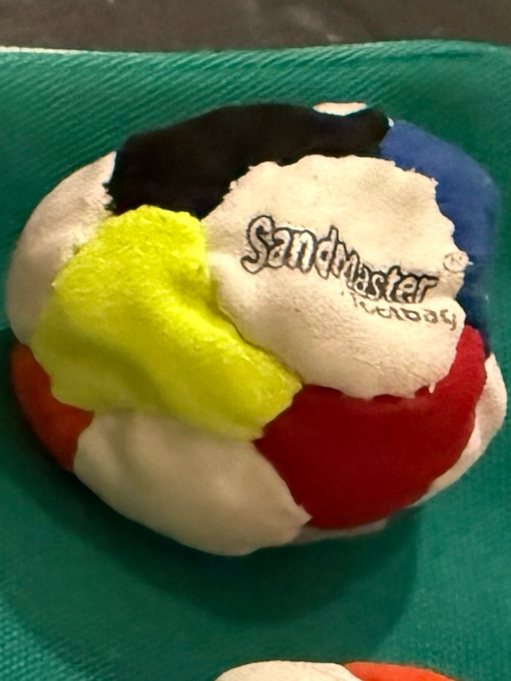 World Footbag Sandmaster - Neon Yellow, Red, Blue & White